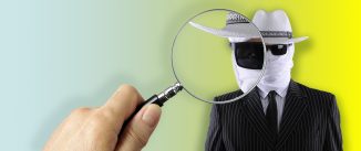 A magnifying glass looks at a man with a bandaged face and sunglasses (aka, "the invisible man").