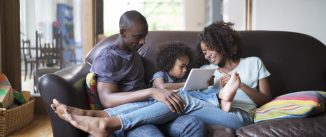 parents and children using an ipad