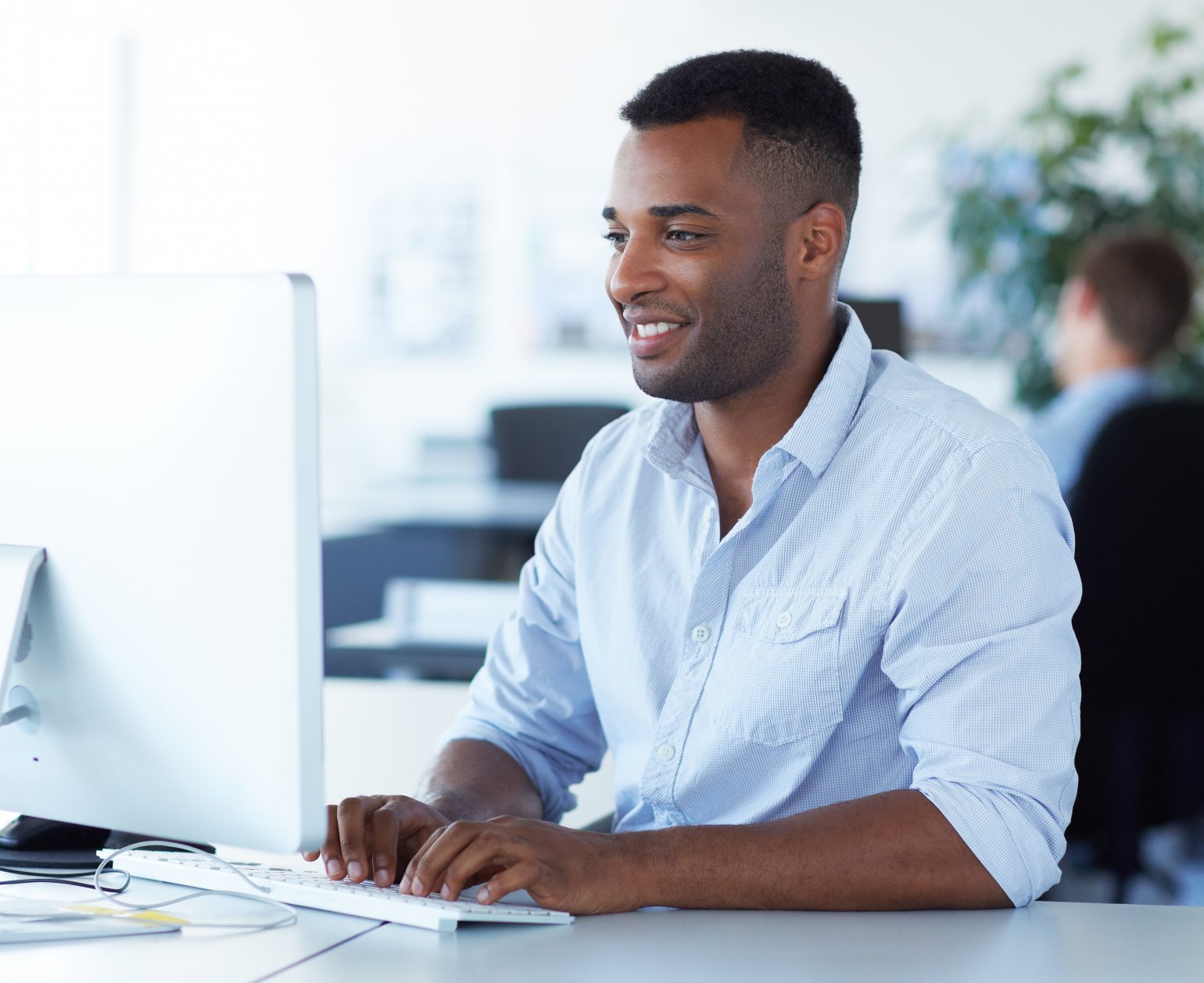 man working at computer