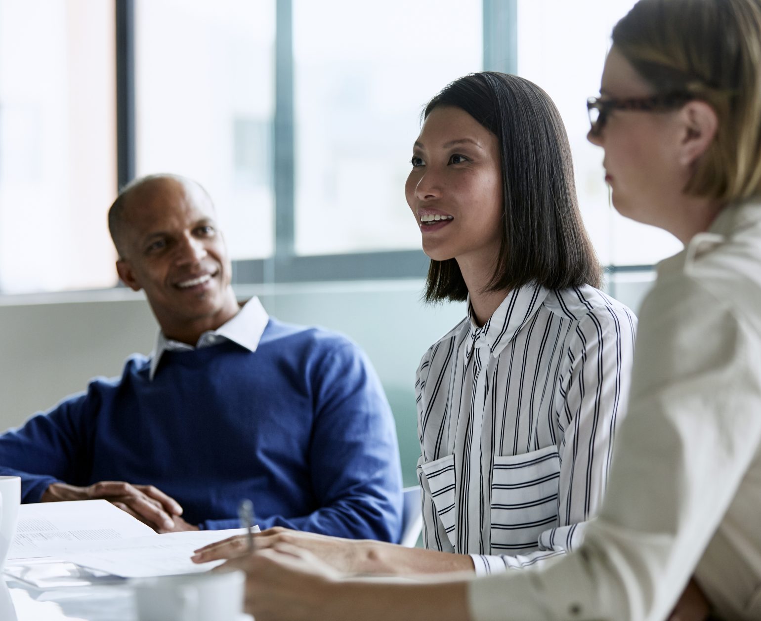 woman leading business meeting