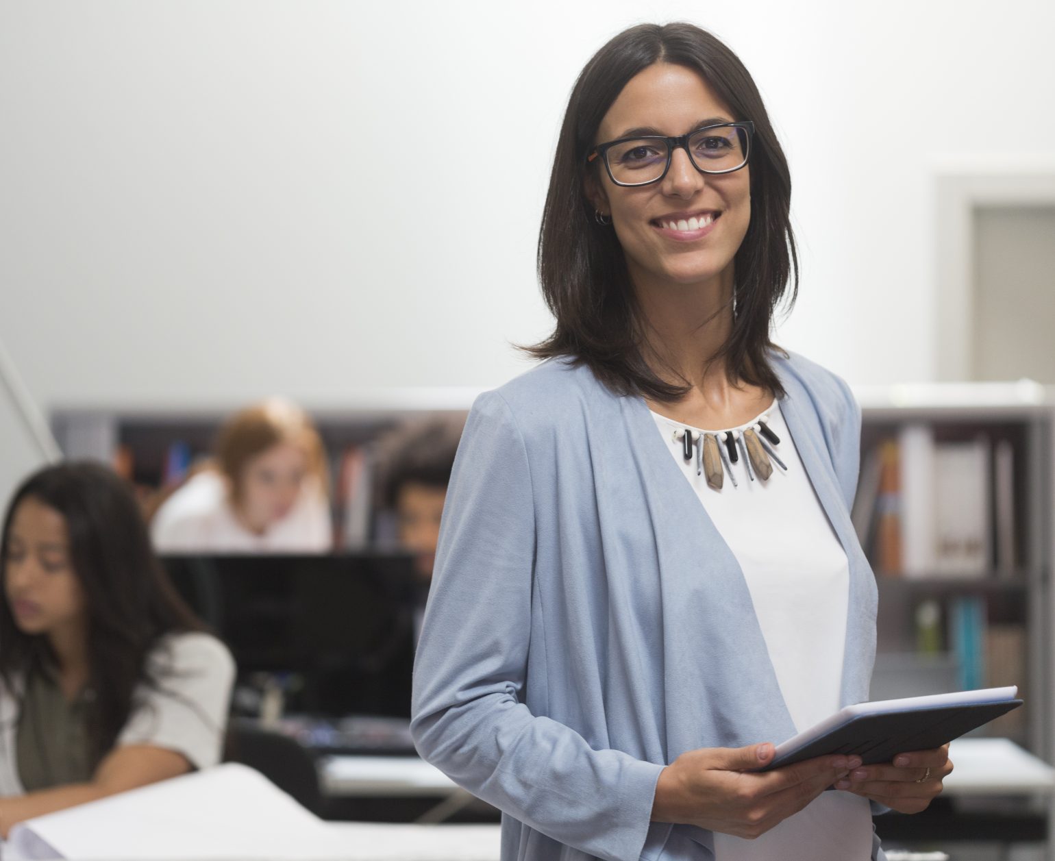 smiling woman with tablet