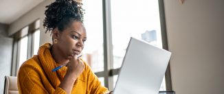 Black woman working from home office